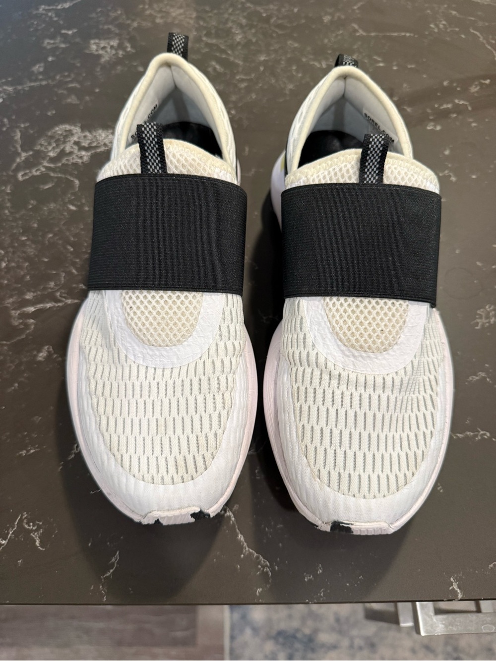 Sorel White and Black Slip-On Athletic Sneakers
